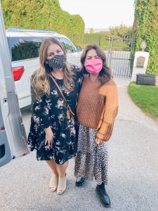Jillian Harris poses with fan in front of her Kelowna Home